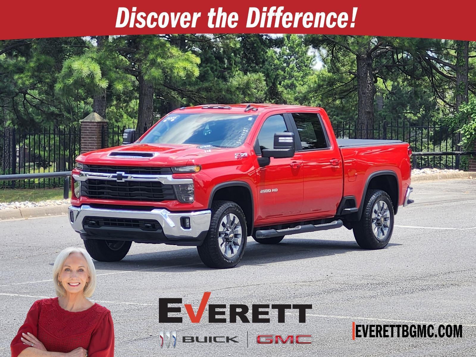 2025 Chevrolet Silverado 2500 HD LT in Red Hot — front three-quarter view