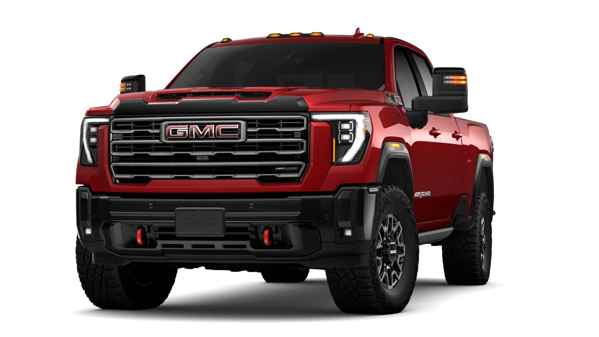 2026 GMC Sierra 2500 HD Crew Cab Standard Box 4-Wheel Drive AT4X in Volcanic Red Tintcoat — front three-quarter view