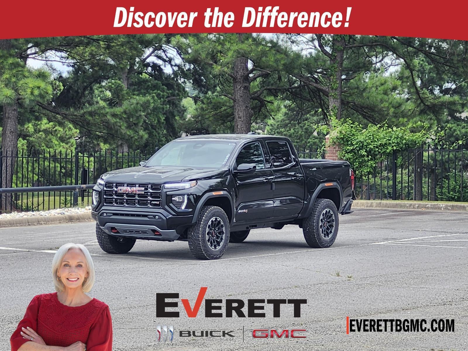 2026 GMC Canyon Crew Cab Short Box 4-Wheel Drive AT4 in Onyx Black — front three-quarter view