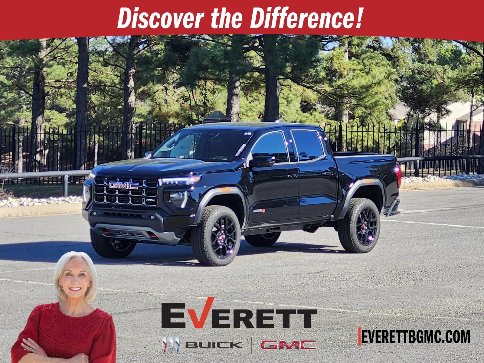 2026 GMC Canyon Crew Cab Short Box 4-Wheel Drive AT4 in Onyx Black — front three-quarter view