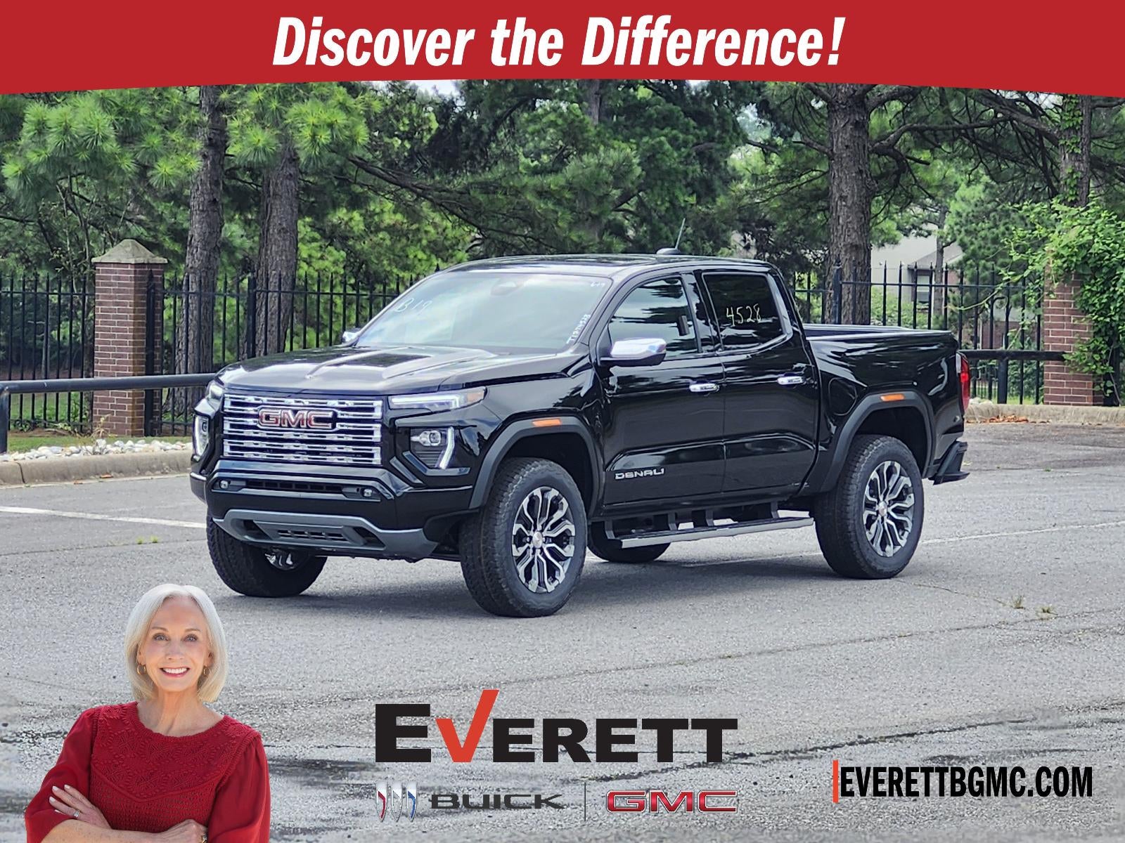 2026 GMC Canyon Crew Cab Short Box 4-Wheel Drive Denali in Onyx Black — front three-quarter view