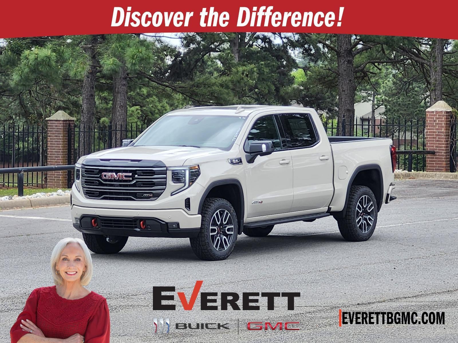2026 GMC Sierra 1500 Crew Cab Short Box 4-Wheel Drive AT4 in Coastal Dune — front three-quarter view