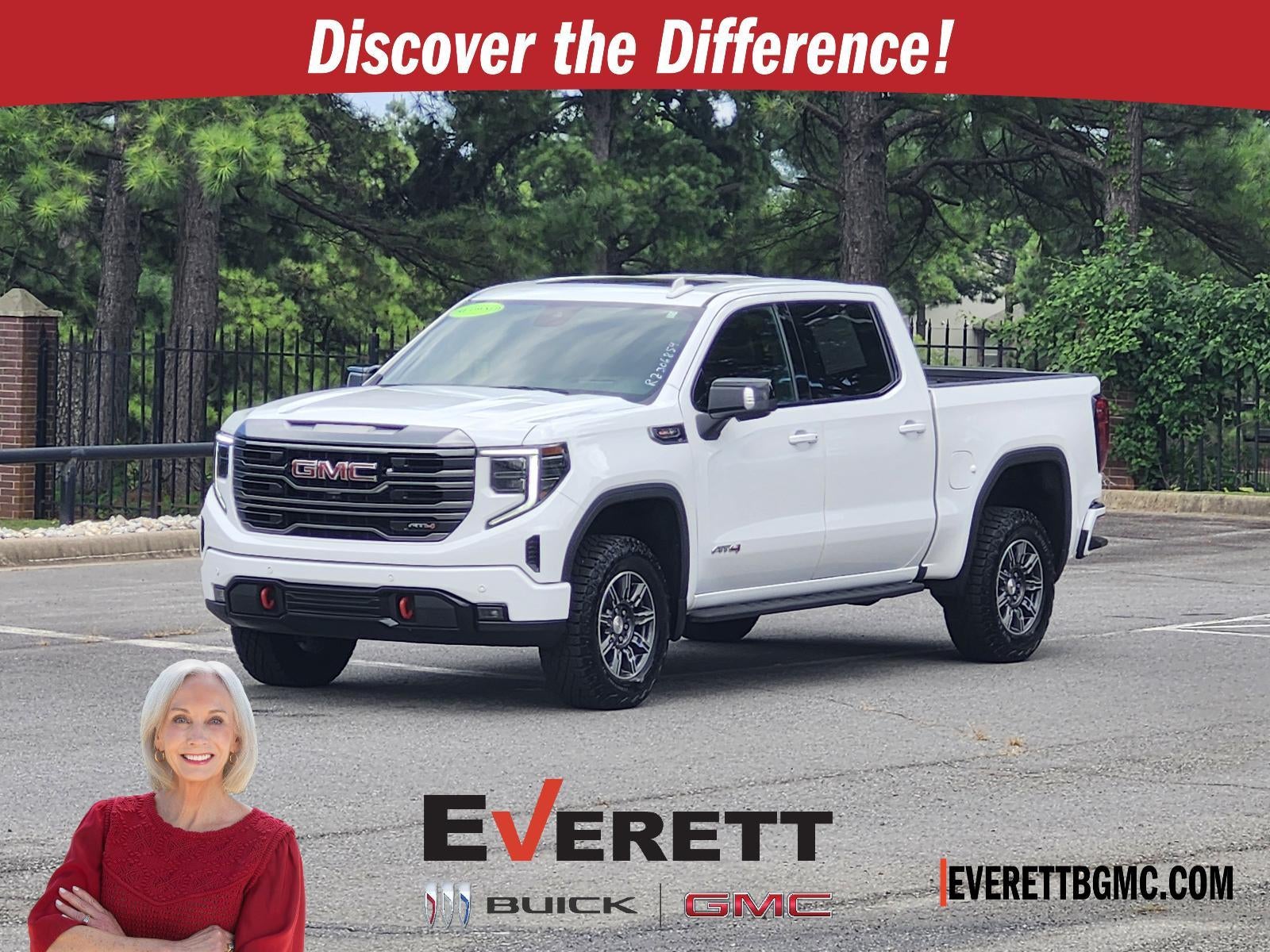 2024 GMC Sierra 1500 AT4 in Summit White — front three-quarter view