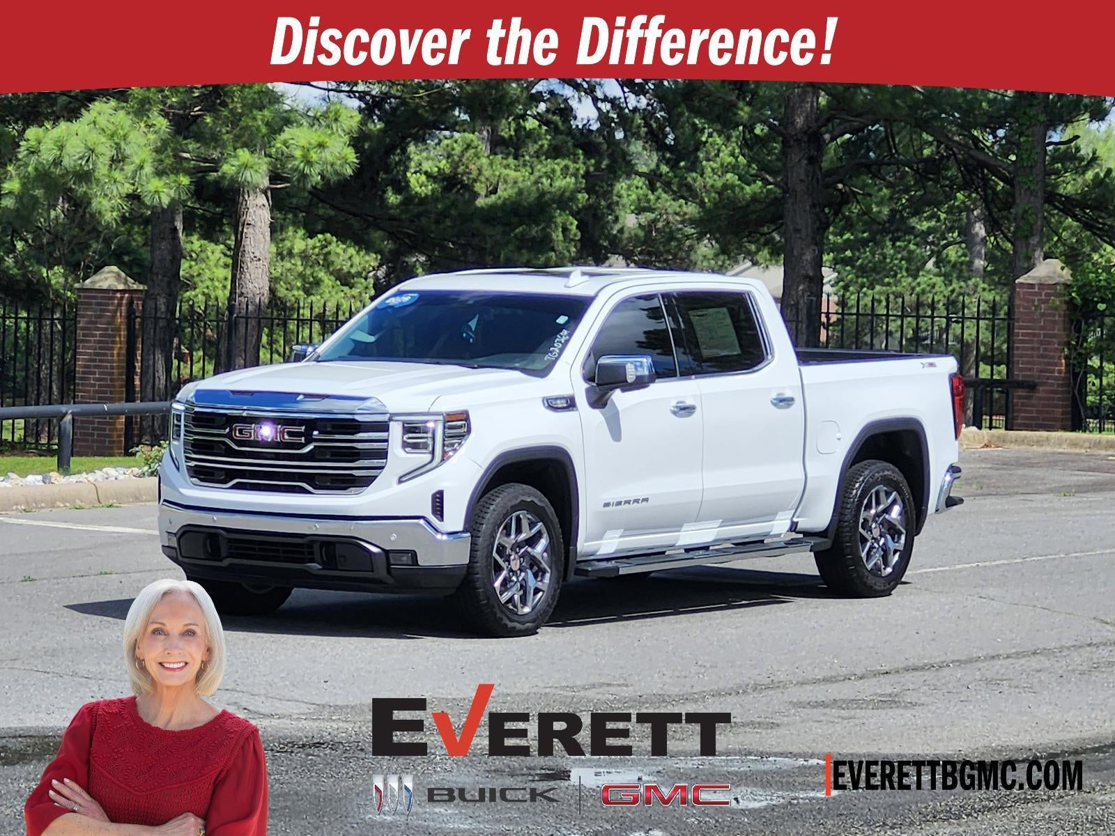 2026 GMC Sierra 1500 SLT in Summit White — front three-quarter view