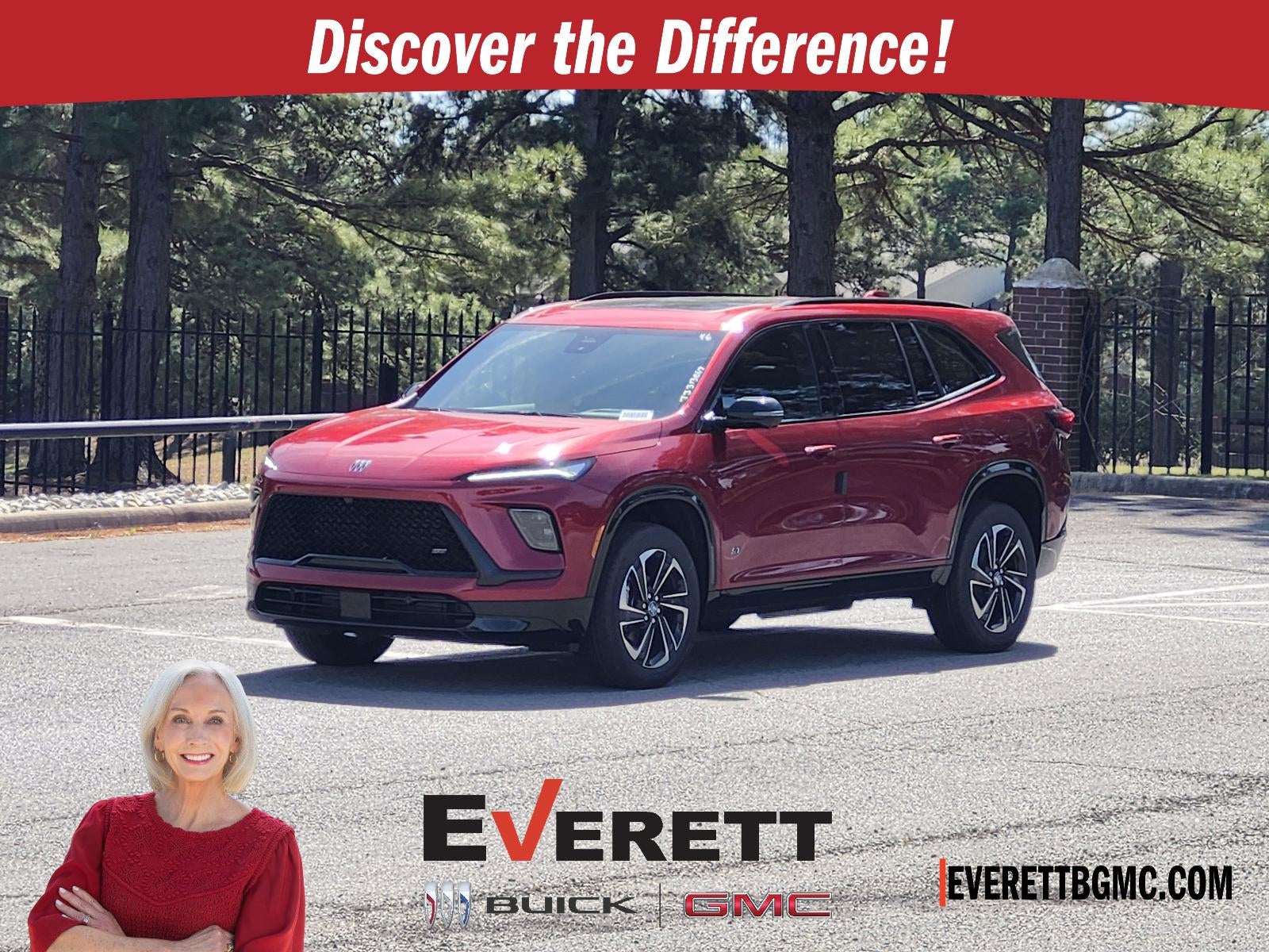 2026 Buick Enclave 4dr Sport Touring in Cherry Red Tintcoat — front three-quarter view