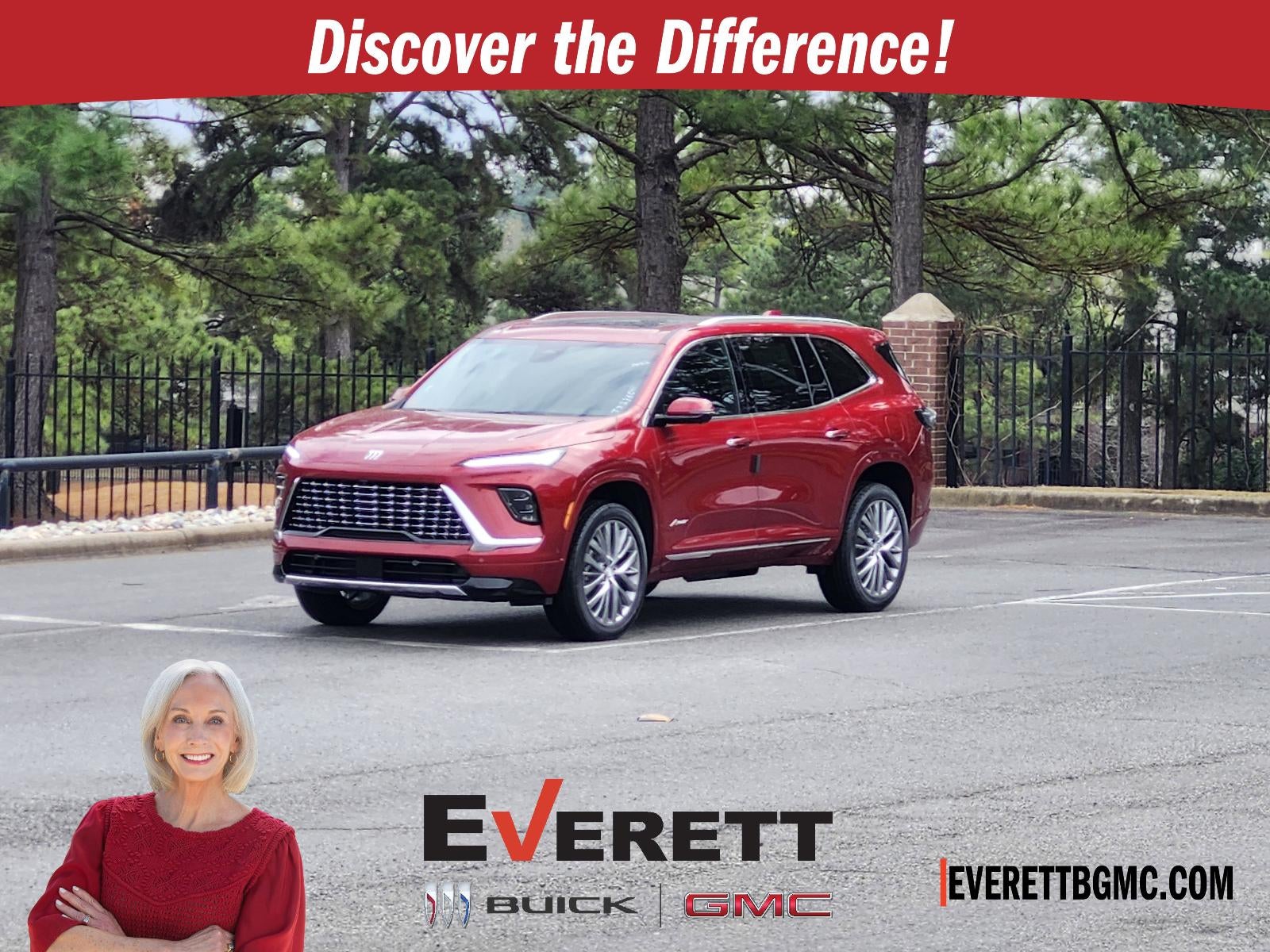 2026 Buick Enclave 4dr Avenir in Cherry Red Tintcoat — front three-quarter view