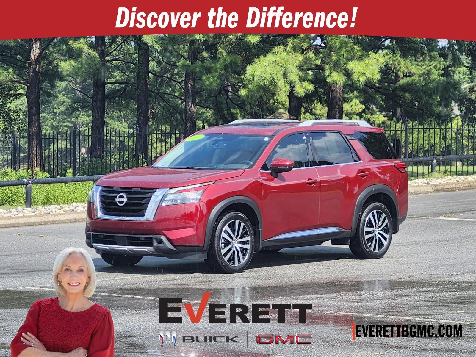 2025 Nissan Pathfinder Platinum in Red — front three-quarter view